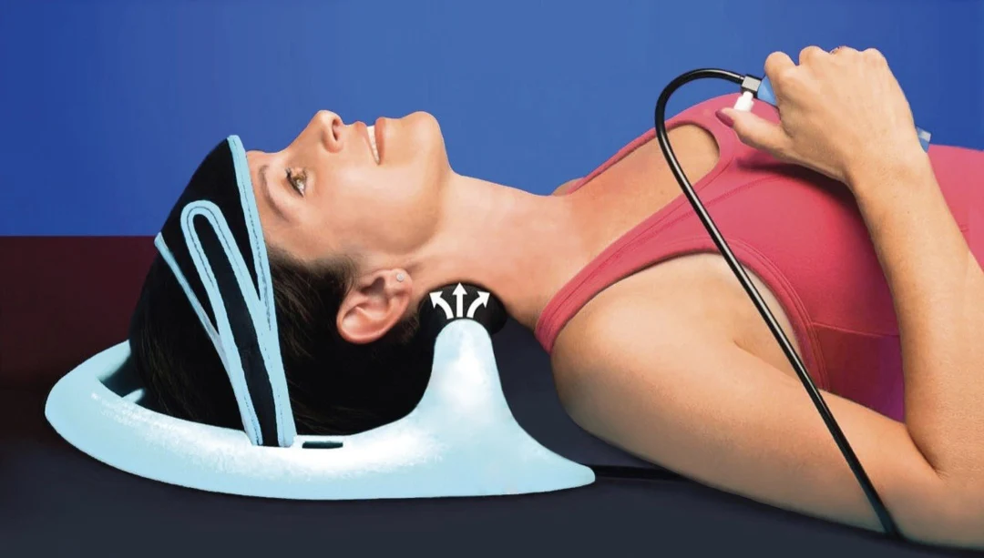 Woman using the Posture Pump neck support while holding its hand pump